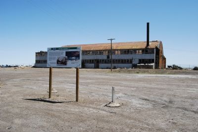 Marker in front of hangar image. Click for full size.