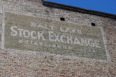 Faded sign on side of building image. Click for full size.