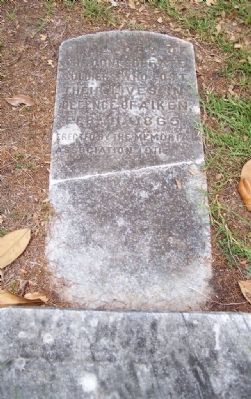 Defense of Aiken Marker broken off and settling flat , in the ground image. Click for full size.