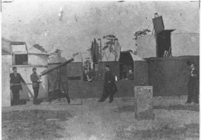 An 1882 picture of the German astronomers and their observatory at Aiken image. Click for full size.
