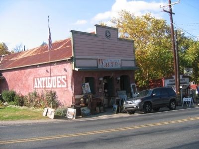 Antique store with marker to right of front door image. Click for full size.