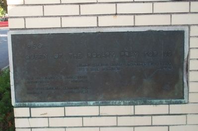 Corner plaque on Queen of the Rosary School. image. Click for full size.