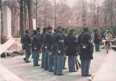 Reenactors representing the 1st U.S. Colored Infantry Regiment meet and greet the public, 1992 image. Click for full size.