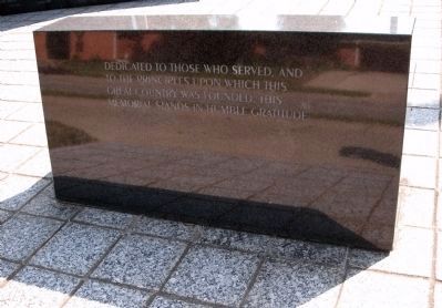 Back of Dedication Stone Bench at Memorial Entrance image. Click for full size.