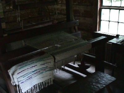 Weave loom exhibit. Click for full size. Weave loom exhibit image. Click for full size.