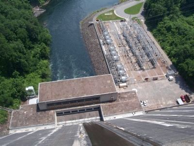 View of the power house and power yard from top of the dam. image. Click for full size.