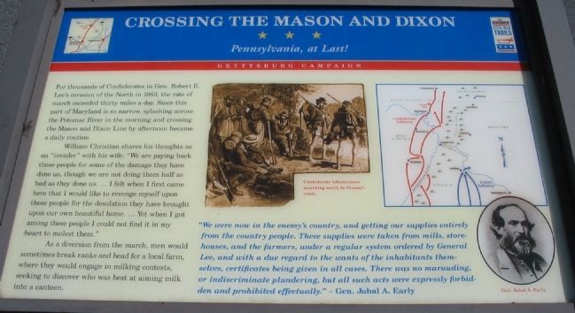 Crossing the Mason and Dixon Marker image. Click for full size.