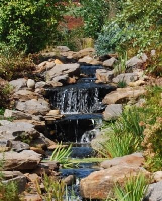Waterfall in the Interpretive Gardens Around the Museum image. Click for full size.