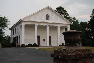 Stone Urn with Church in Background image. Click for full size.