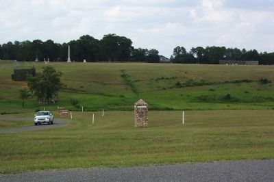 North Gate on Left Slope Behind Trees image. Click for full size.