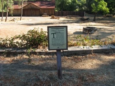Sierra Nevada House Marker with Well in Background. Click for full size. Sierra Nevada House Marker with Well in Background image. Click for full size.