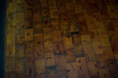 Former Hitching Posts Used for Floor of Black Jack Museum Room. Click for full size. Former Hitching Posts Used for Floor of Black Jack Museum Room image. Click for full size.