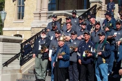 Alumni Trumpets on the steps of the main building image. Click for full size.