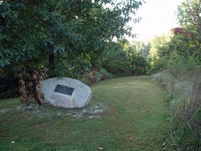 It is very wteep down hill behind boulder image. Click for full size.