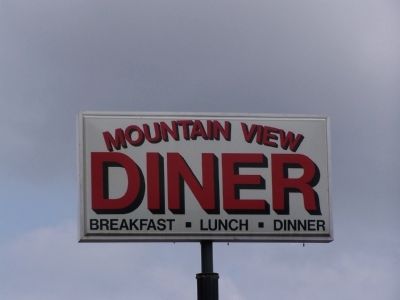 Marker is in the parking lot of the Mountain View Diner image. Click for full size.