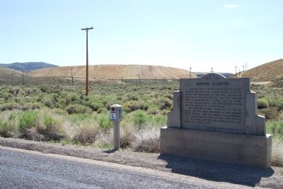 Marker and waste rock piles in the distance image. Click for full size.
