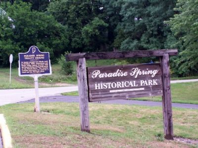 The Paradise Spring Treaty Ground Marker and the park sign.. Click for full size. The Paradise Spring Treaty Ground Marker and the park sign. image. Click for full size.