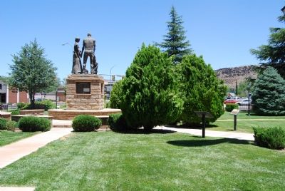 Statue of pioneers in the park. Marker is on base of statue. image. Click for full size.