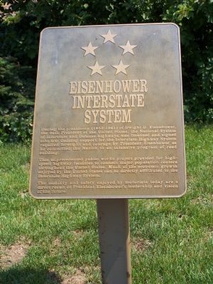 Eisenhower Interstate System plaque, next to the Welcome Center. image. Click for full size.