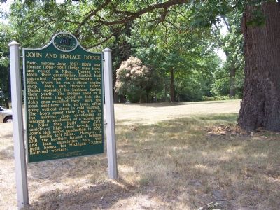 The lot where the Dodge home once stood, is now empty except for the marker. image. Click for full size.