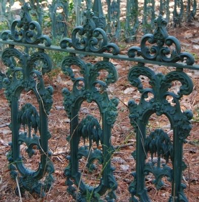 Detail of Stylized Palmetto Tree Used in Many of the Iron Fences Around Plots image. Click for full size.
