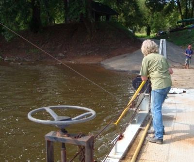 Poling the Hatton Ferry. Click for full size. Poling the Hatton Ferry image. Click for full size.