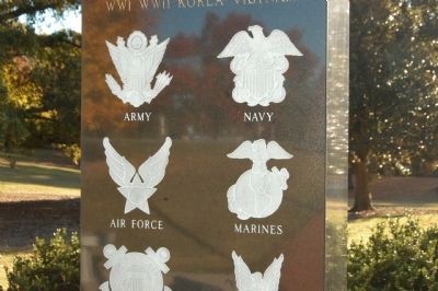 Seals from four of the DoD services on the Spartanburg County War Memorial image. Click for full size.