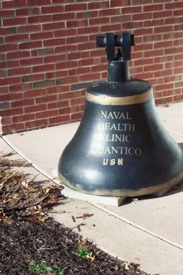 Bell near entrance to Quantico Naval Health Clinic image. Click for full size.
