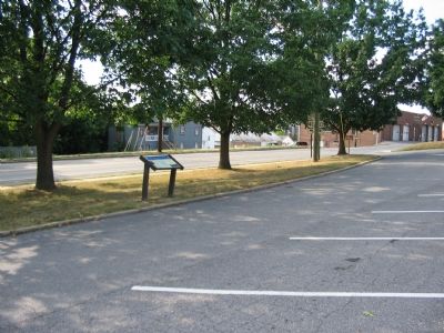 The Marker Stands beside the Road in the Church Parking Lot image. Click for full size.