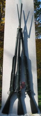 Stand of Rifles on Front of Monument image. Click for full size.