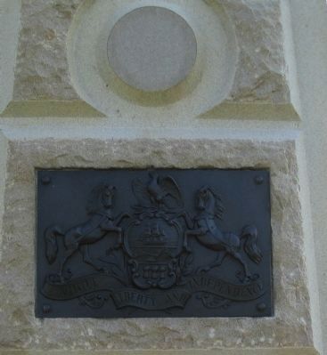 Corps Badge and State Seal on Front of Monument image. Click for full size.