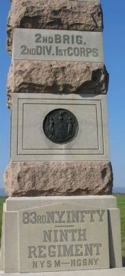 Front of Monument with State Seal image. Click for full size.