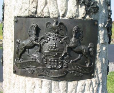 State Seal on Monument image. Click for full size.