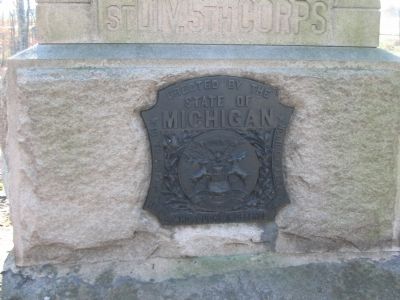 State Seal on the Front of the Monument. Click for full size. State Seal on the Front of the Monument image. Click for full size.