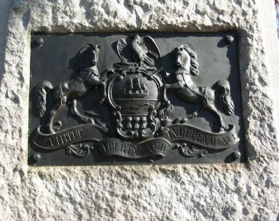 State Coat of Arms on Front of Monument. Click for full size. State Coat of Arms on Front of Monument image. Click for full size.