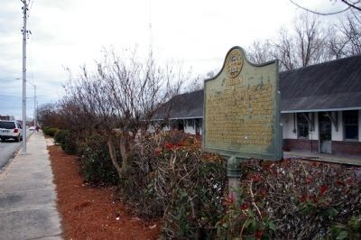 W.Cotton Street, the Millen marker, railroad tracks, and the Millen Depot image. Click for full size.