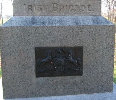 Left Side of Monument with State Coat of Arms. Click for full size. Left Side of Monument with State Coat of Arms image. Click for full size.