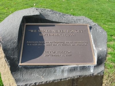 "We Shall Never Forget" Marker. Click for full size. "We Shall Never Forget" Marker image. Click for full size.