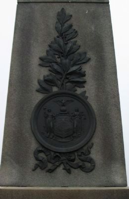 State Seal and Branch on Front of Monument. Click for full size. State Seal and Branch on Front of Monument image. Click for full size.