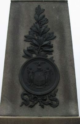 State Seal and Branch on Front of Monument image. Click for full size.
