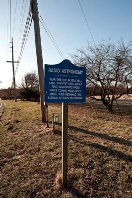 Radio Astronomy plaque near roadway image. Click for full size.