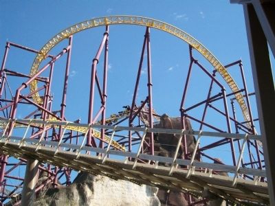 Riders blast out of the top of the Volcano. Click for full size. Riders blast out of the top of the Volcano image. Click for full size.