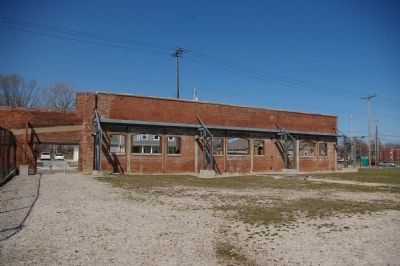 Remains of the bleachers and exterior wall image. Click for full size.