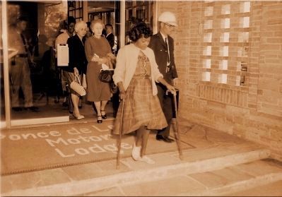 Mrs. Georgie Mae Reed leaving the Ponce de Leon Motor Lodge image. Click for full size.