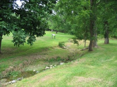The Marker is a Leap Across the Creek from the Road. Click for full size. The Marker is a Leap Across the Creek from the Road image. Click for full size.