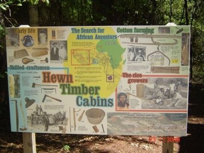 Hewn-Timber Cabins Information Sign image. Click for full size.