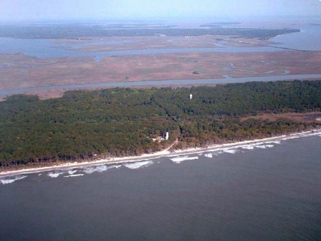 Hunting Island Light Station , seen from the air, Atlantic Ocean, looking west image. Click for full size.
