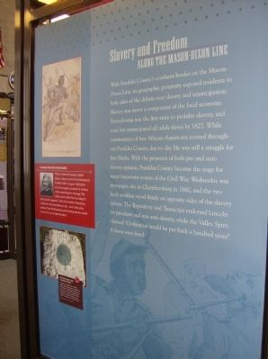 Slavery and Freedom Interpretive Panel in the nearby Heritage Center image. Click for full size.