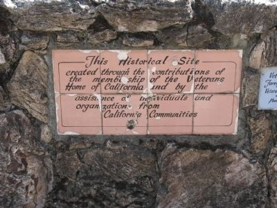 Plaque Mounted on Stone Wall at the Marker Location image. Click for full size.