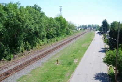 View off Overpass Looking East -<br>Railroad Bed and Moore Street image. Click for full size.